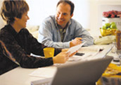 Image of couple discussing mail